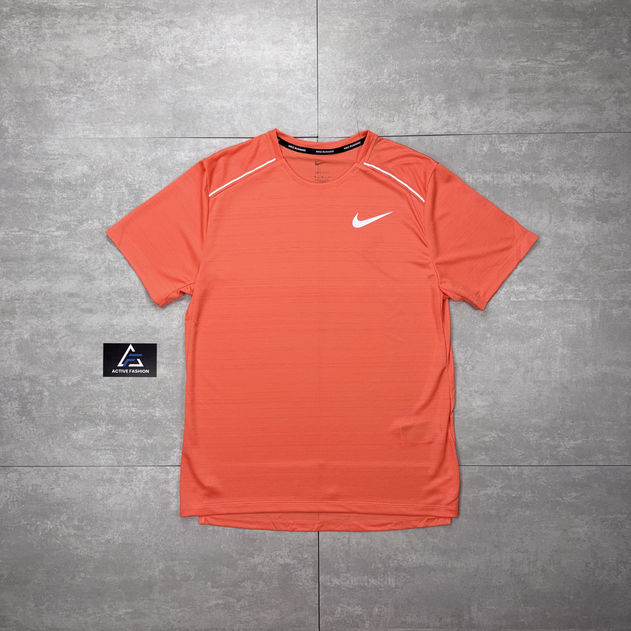 bright orange nike shirt